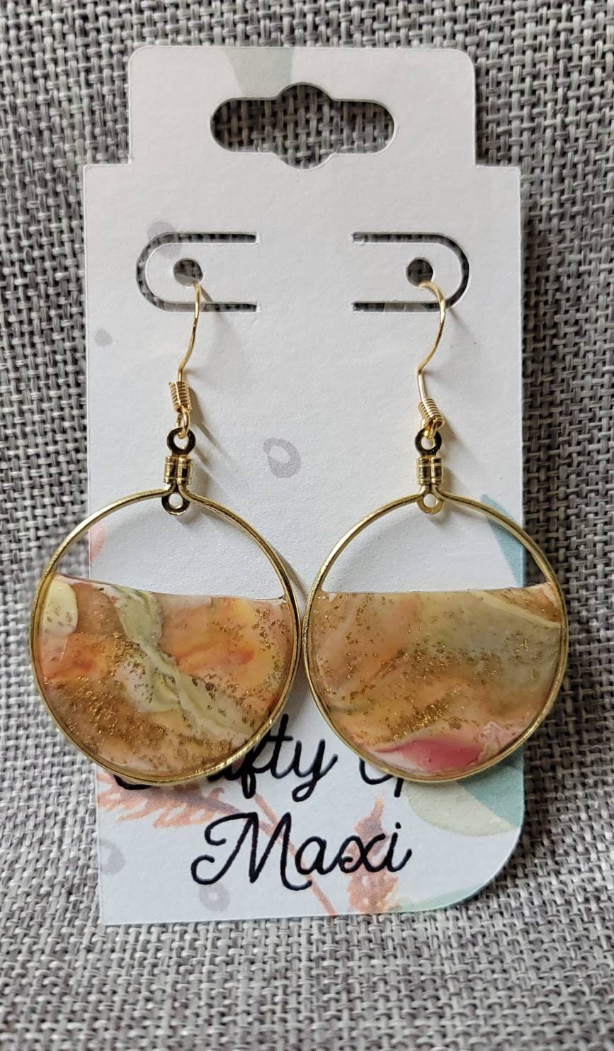 Fall hoop clay earrings made in autumn gold tones. Handmade round autumn clay earrings. Statement earrings. Lightweight modern earrings.